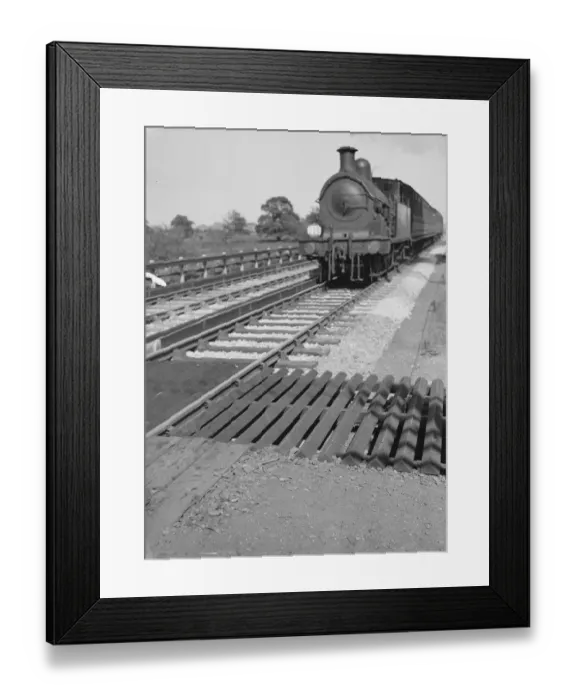 Framed Print : A steam engine coming through the Shorne level crossing in Kent. 1939