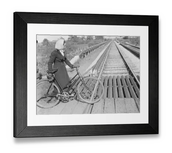 Framed Print : A women pushing her bicycle over the Shorne level crossing in Knet. 1939 Framed Print : A women pushing her bicycle over the Shorne level crossing in Knet. 1939