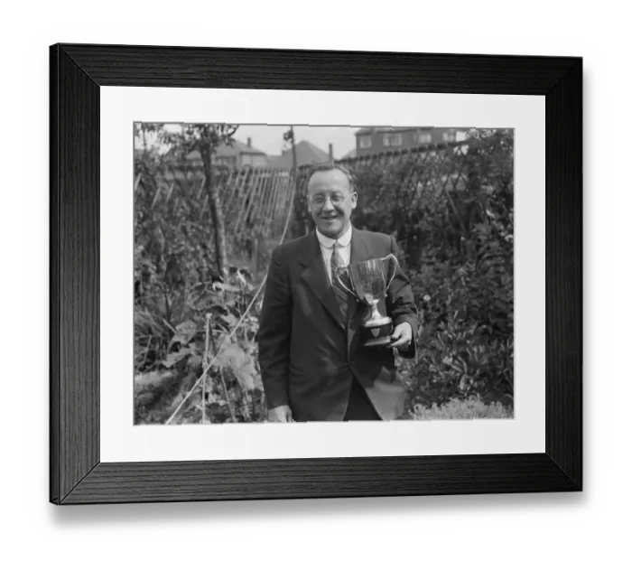 Framed Print : A W Costley, the Secretary of Crayford Horticultural Society, posing with his trophy