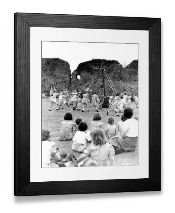 Framed Print : Children from Eynsford Primary School had a maypole dance within the walls of Framed Print : Children from Eynsford Primary School had a maypole dance within the walls of