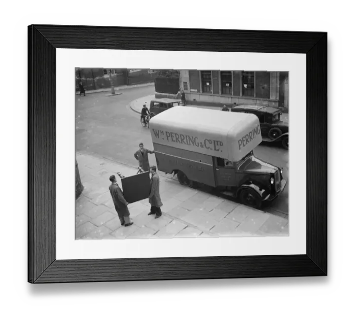 Framed Print : A Bedford truck belonging to W Perring and Co Ltd, the house furnishers. Workers Framed Print : A Bedford truck belonging to W Perring and Co Ltd, the house furnishers. Workers