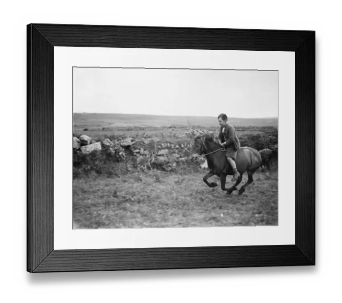 Framed Print : A young boy rides a horse bareback. 1936 Framed Print : A young boy rides a horse bareback. 1936