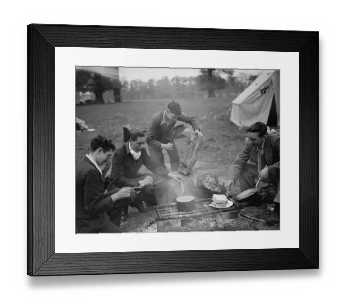 Framed Print : Chopping wood ( with a kukri, Nepalese knife ) and cooking around the camp fire Framed Print : Chopping wood ( with a kukri, Nepalese knife ) and cooking around the camp fire