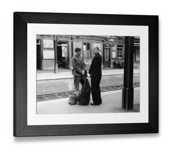 Framed Print : A soldier on his way to his unit. His father waits to say goodbye on Sidcup station