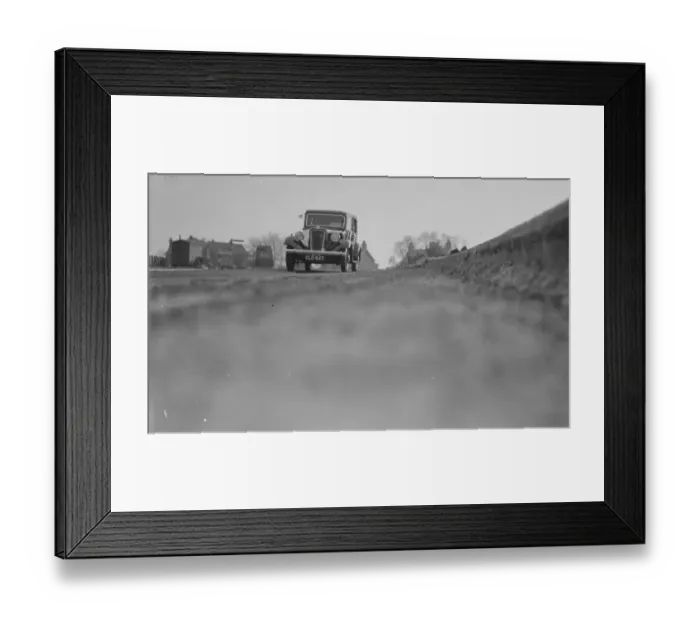 Framed Print : Workmen lay the foundations for road banking along the edges of the road in Farningham Framed Print : Workmen lay the foundations for road banking along the edges of the road in Farningham