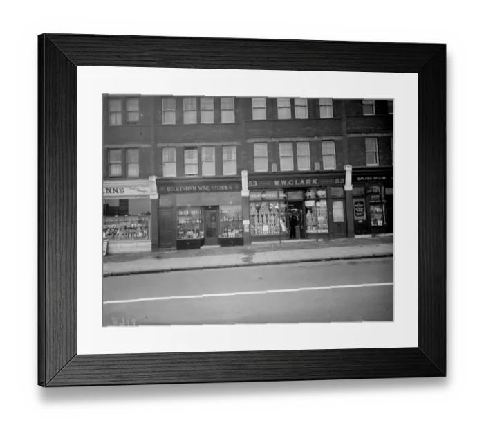 Framed Print : Shops along the high street in Beckenham, Kent 1 March 1938 Framed Print : Shops along the high street in Beckenham, Kent 1 March 1938