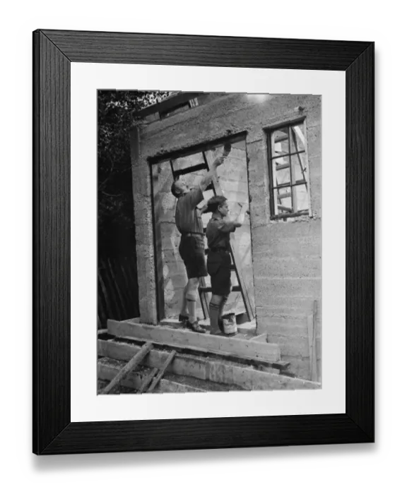Framed Print : The Bridgen scouts build their own headquarters. With the guidance of an aldult Framed Print : The Bridgen scouts build their own headquarters. With the guidance of an aldult