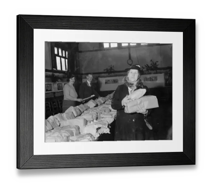 Framed Print : Gifts for the Christmas Cheer Fund in Chislehurst, Kent, piled on the table Framed Print : Gifts for the Christmas Cheer Fund in Chislehurst, Kent, piled on the table