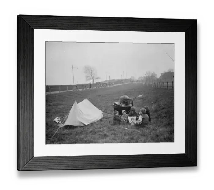 Framed Print : Children have a picnic on a bit of grass next to the road. 1938