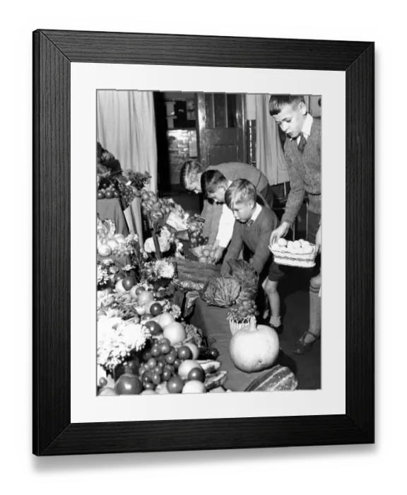 Framed Print : Young children bring their gifts to the Harvest Festival Service - held at Foster s Framed Print : Young children bring their gifts to the Harvest Festival Service - held at Foster s