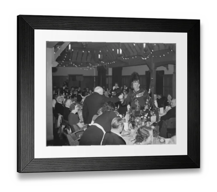 Framed Print : Burns night in Bexleyheath, Kent. The bagpiper is give a drink. 4 February 1939 Framed Print : Burns night in Bexleyheath, Kent. The bagpiper is give a drink. 4 February 1939