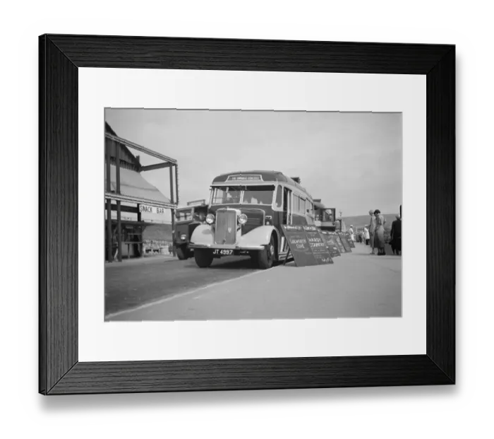 Framed Print : Swanage tour coaches on the sea front in Swanage, Dorset. 1936 Framed Print : Swanage tour coaches on the sea front in Swanage, Dorset. 1936