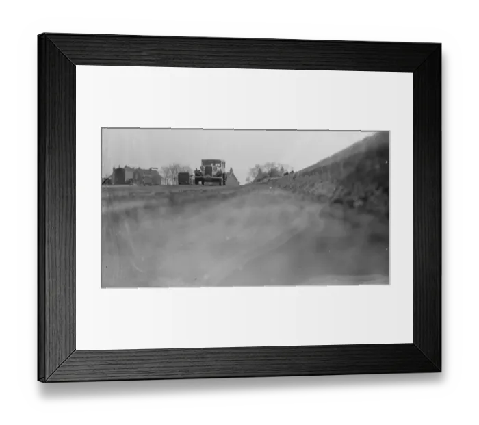 Framed Print : Workmen lay the foundations for road banking along the edges of the road in Farningham Framed Print : Workmen lay the foundations for road banking along the edges of the road in Farningham