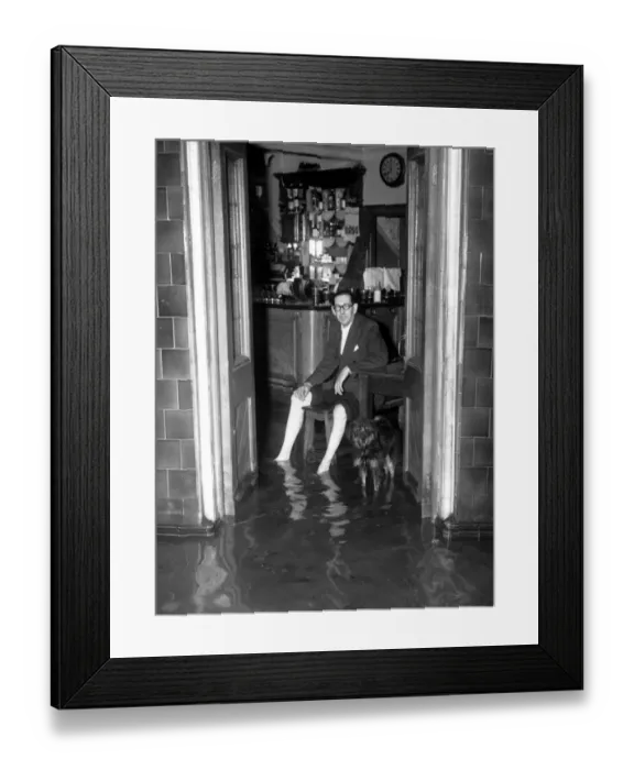 Framed Print : Thames Floods At Belvedere licensee of the Belvoir sits in his bar and watches Framed Print : Thames Floods At Belvedere licensee of the Belvoir sits in his bar and watches