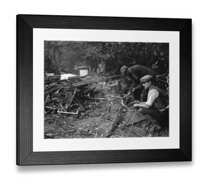 Framed Print : Workmen clearing up metal dumped in an orchard in St Mary Cray, Kent Framed Print : Workmen clearing up metal dumped in an orchard in St Mary Cray, Kent