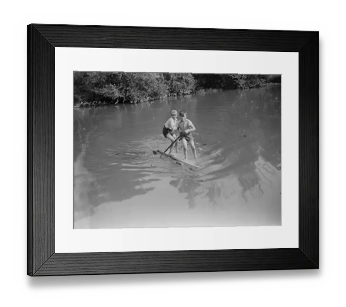 Framed Print : Boys crossing the river on a raft. 1935