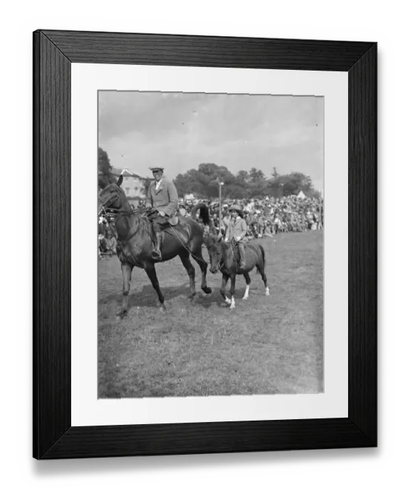 Framed Print : The Eltham and Bromley gymkhama. Young riders competition, riding round the ring