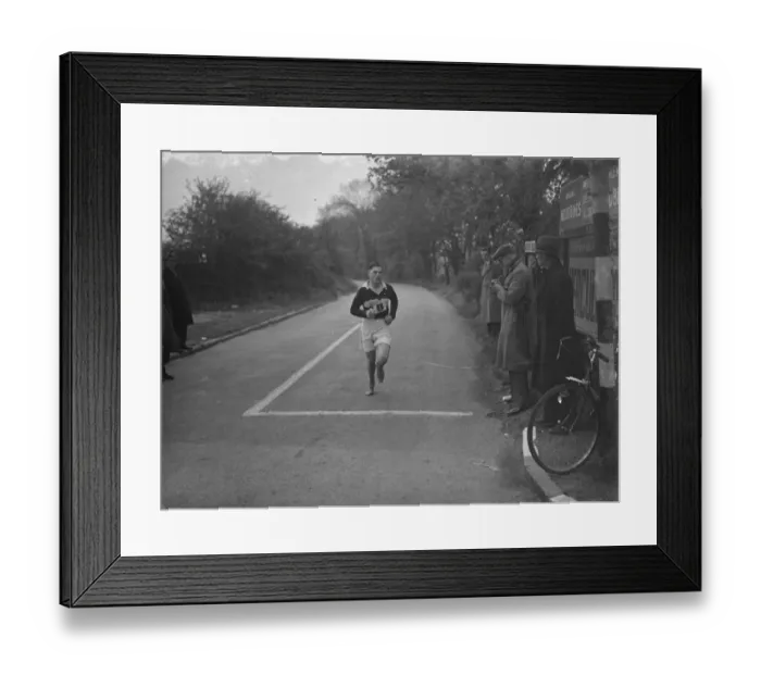 Framed Print : W E Booker, competing in the Kent Marathon, passes through Dartford, Kent Framed Print : W E Booker, competing in the Kent Marathon, passes through Dartford, Kent