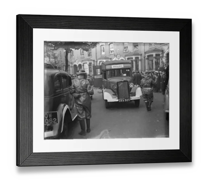 Framed Print : Air Raid Precaution exercise on Old Kent Road in London. A Bedford ambulance taking Framed Print : Air Raid Precaution exercise on Old Kent Road in London. A Bedford ambulance taking