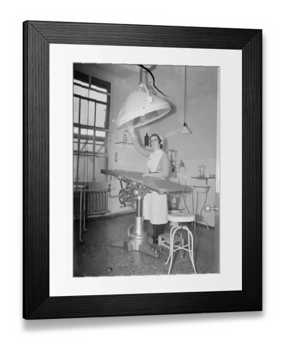 Framed Print : The Sidcup Cottage Hospital in Kent. A sister woking in the operating theatre Framed Print : The Sidcup Cottage Hospital in Kent. A sister woking in the operating theatre