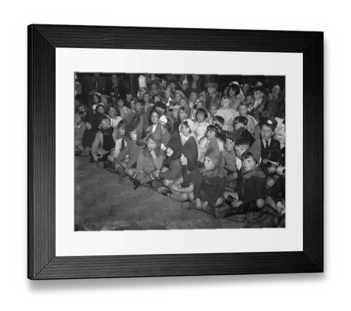 Framed Print : Children at Sidcup Hill School in their christmas party fancy dress costumes