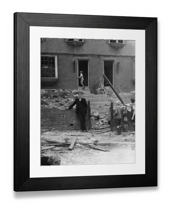 Framed Print : Children inspecting the damage after a bomb fell in Gravesend, Kent during WWII Framed Print : Children inspecting the damage after a bomb fell in Gravesend, Kent during WWII