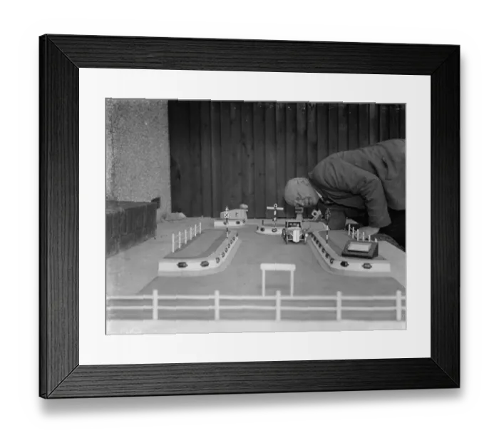 Framed Print : Mr J Ratcliff with a model of Wren Road in Sidcup, Kent. 12 April 1938 Framed Print : Mr J Ratcliff with a model of Wren Road in Sidcup, Kent. 12 April 1938