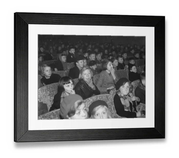 Framed Print : Childrens Christmas cinema treat at the Odeon in Sidcup, Kent. 1938 Framed Print : Childrens Christmas cinema treat at the Odeon in Sidcup, Kent. 1938