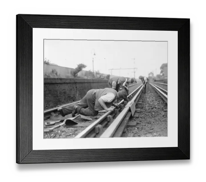 Framed Print : A railwayman gauging railway lines in Sidcup, Kent. 1937 Framed Print : A railwayman gauging railway lines in Sidcup, Kent. 1937