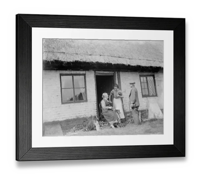 Framed Print : The elderly inhabitants of the thatched cottages in Bredgar, Kent, sitting outside Framed Print : The elderly inhabitants of the thatched cottages in Bredgar, Kent, sitting outside