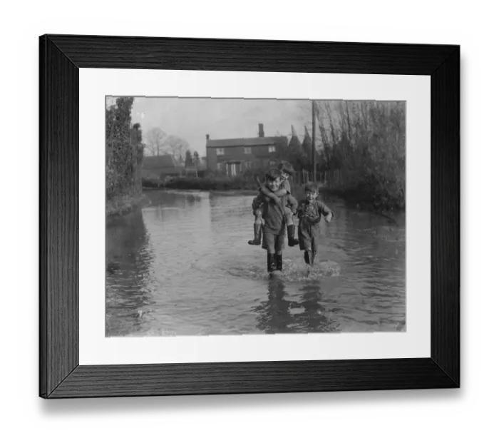 Framed Print : Boys work their way through the floods in Beltring, Kent. 1936 Framed Print : Boys work their way through the floods in Beltring, Kent. 1936