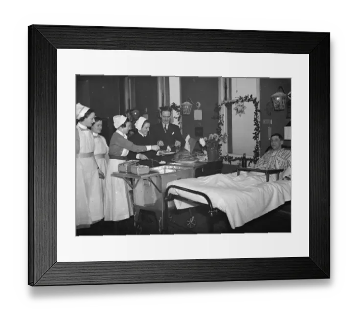 Framed Print : Doctor Sinclair carving the Christmas turkey for the patients on the ward at Erith Framed Print : Doctor Sinclair carving the Christmas turkey for the patients on the ward at Erith