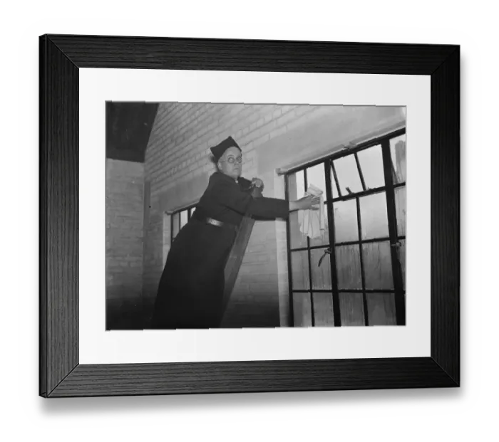 Framed Print : The Reverend M Cox cleaning windows in Swanscombe, Kent. 1937 Framed Print : The Reverend M Cox cleaning windows in Swanscombe, Kent. 1937