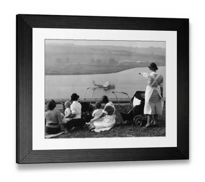 Framed Print : Nursemaids in Rochester, Kent, have a good view of the flying boat tests on Framed Print : Nursemaids in Rochester, Kent, have a good view of the flying boat tests on