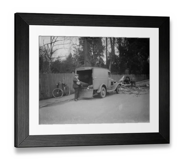 Framed Print : Workers clear a tree blown down by the gales in Crayford. 1938