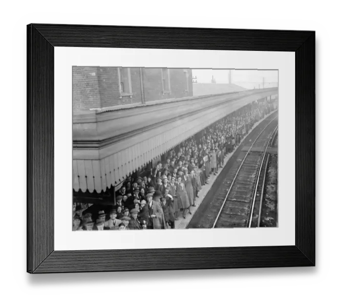 Framed Print : A crowded station platform full of Dartford supporters en route to the match between Framed Print : A crowded station platform full of Dartford supporters en route to the match between