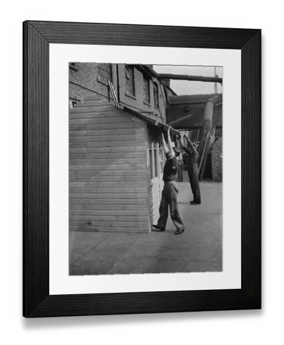 Framed Print : Making a shed at the at the G Ellis joinery works in Hackney. 7 April 1938 Framed Print : Making a shed at the at the G Ellis joinery works in Hackney. 7 April 1938