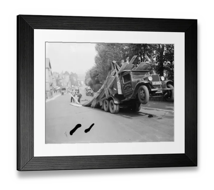 Framed Print : A lorry tips backwards, spilling its load in Sevenoaks, Kent. 1935 Framed Print : A lorry tips backwards, spilling its load in Sevenoaks, Kent. 1935
