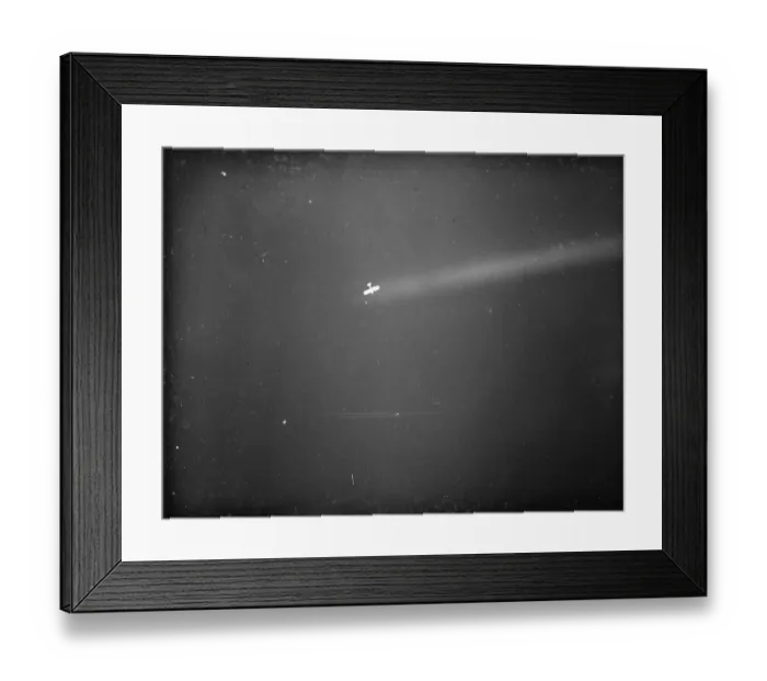 Framed Print : An anti aircraft display in Dartford, Kent. An aeroplane is caught by a searchlight Framed Print : An anti aircraft display in Dartford, Kent. An aeroplane is caught by a searchlight
