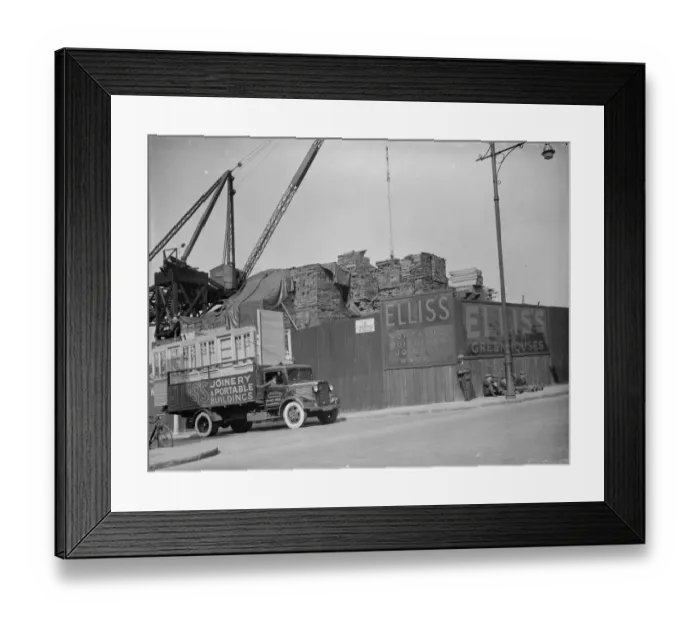 Framed Print : Wood stacks at the G Ellis joinery works in Hackney. 7 April 1938