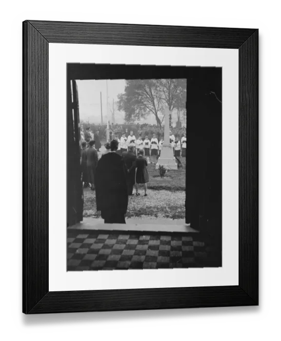 Framed Print : Armistice memorial service in Erith, London, observed through a doorway