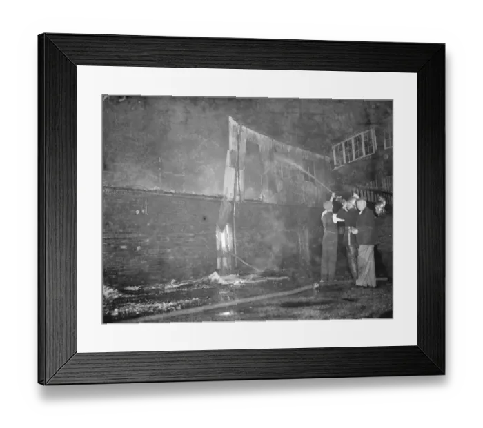 Framed Print : Fire, Halls, Dartford. Firemen dampening down the burnt - out building Framed Print : Fire, Halls, Dartford. Firemen dampening down the burnt - out building