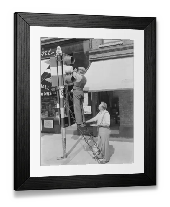 Framed Print : Traffic lights beings obscured for an Air Raid Precautions drill at Gravesend, Kent Framed Print : Traffic lights beings obscured for an Air Raid Precautions drill at Gravesend, Kent