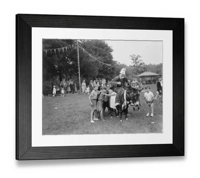 Framed Print : A clown rides a donkey at the Dartford Carnival in Kent. 1937 Framed Print : A clown rides a donkey at the Dartford Carnival in Kent. 1937