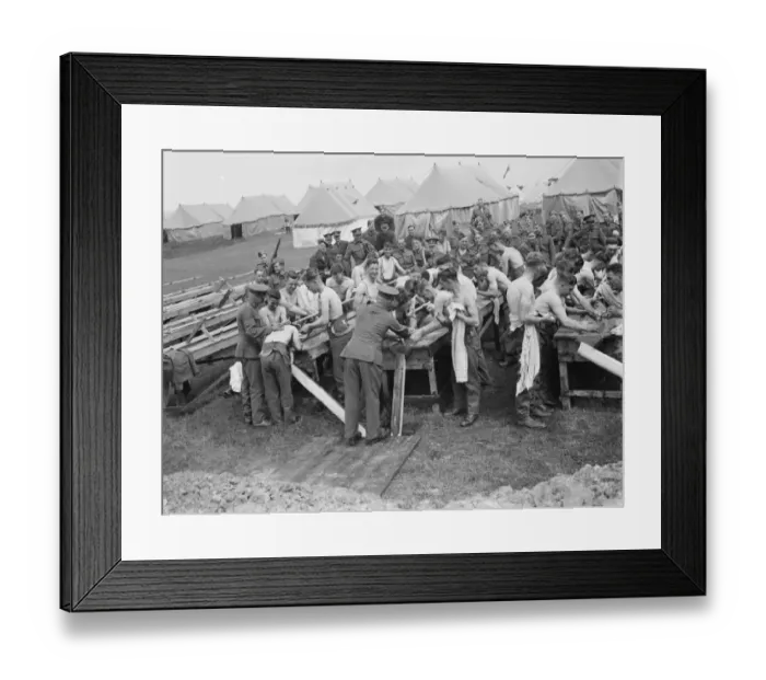 Framed Print : Territorial Army recruits at camp in Lympne, Kent. Washing in the open