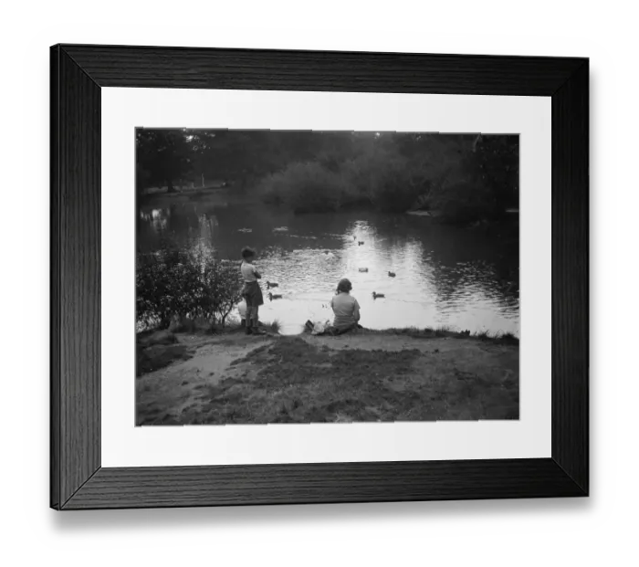 Framed Print : Children play with toy sailing boats in Dartford park. 24 August 1937 Framed Print : Children play with toy sailing boats in Dartford park. 24 August 1937