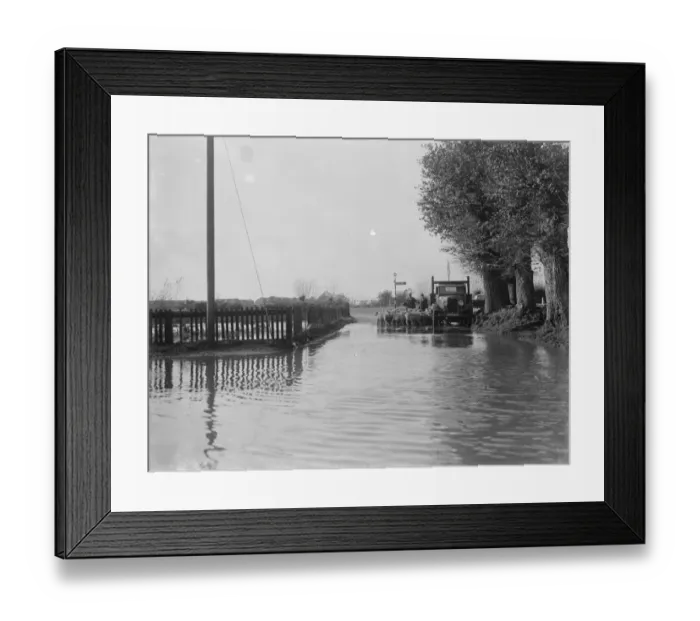 Framed Print : A farmer and his sheep next to a flooded area in Beltring, Kent. 1936 Framed Print : A farmer and his sheep next to a flooded area in Beltring, Kent. 1936