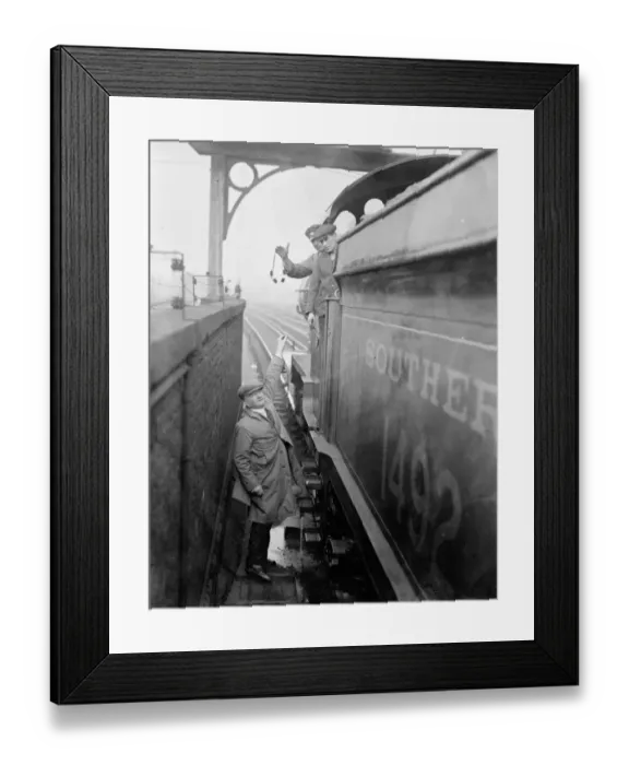 Framed Print : The Dartford Football Club mascot chats to the engine drivers en route to the match Framed Print : The Dartford Football Club mascot chats to the engine drivers en route to the match