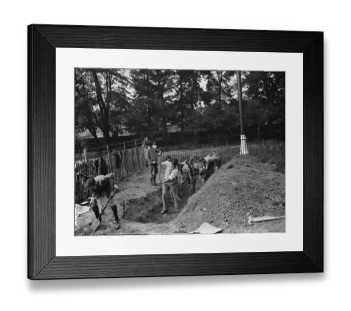 Framed Print : The Bridgen scouts build their own headquarters. Boys digging the sewer foundation Framed Print : The Bridgen scouts build their own headquarters. Boys digging the sewer foundation