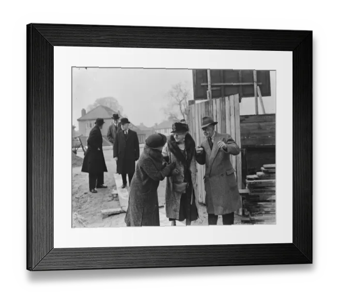 Framed Print : An elderly woman is being shown around the new ambulance headquarters in Dartford, Kent